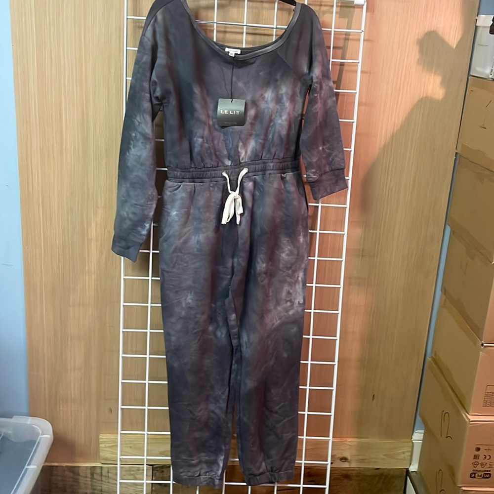 Le Lis full body romper. Gray, NWT. Shorter sleeve on one side design